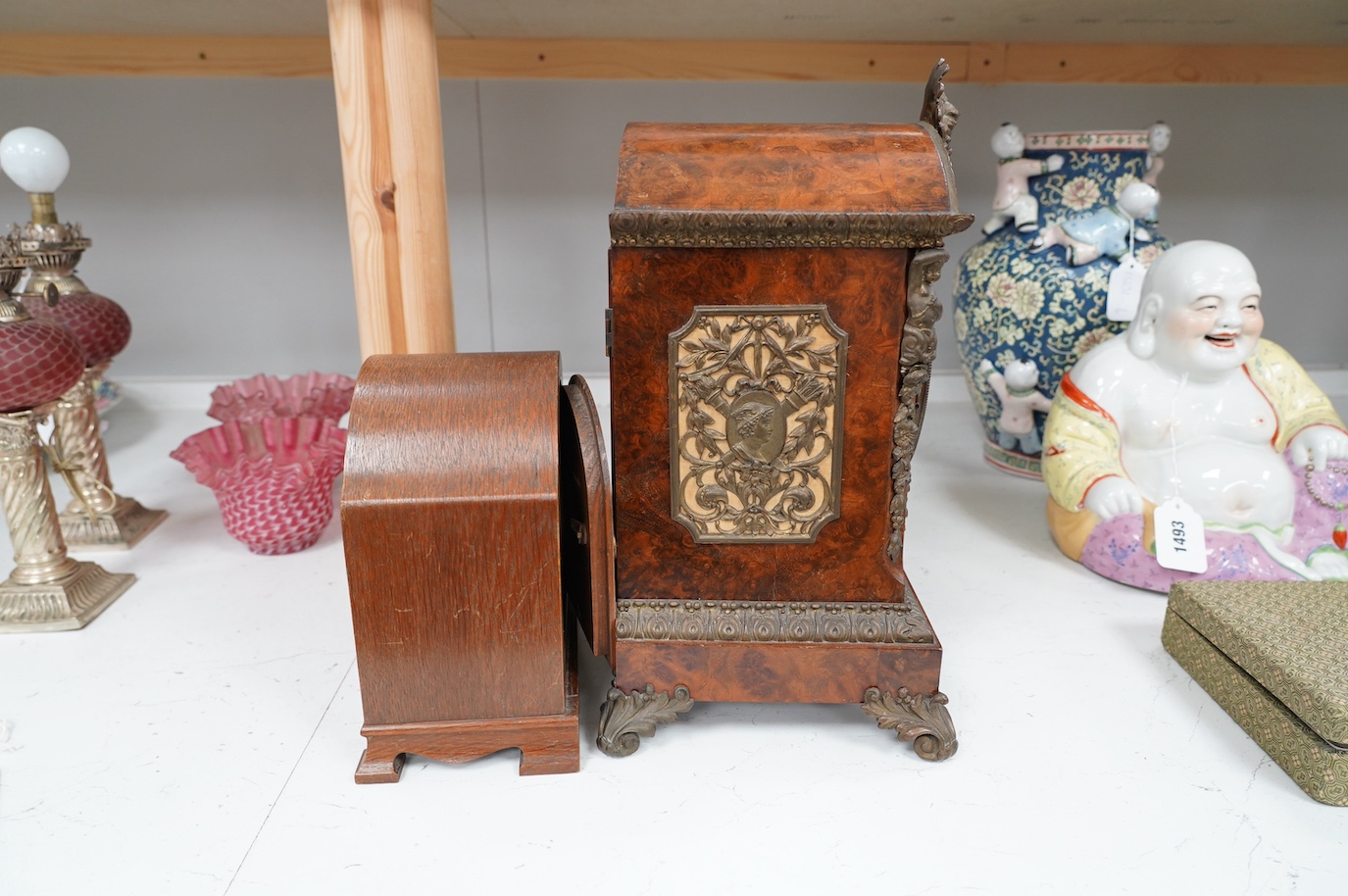 A late 19th century brass mounted burr walnut bracket clock with key and pendulum, and an oak mantel clock, tallest 37cm. Condition - poor to fair